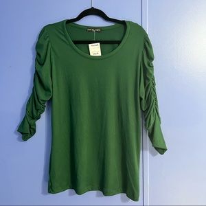 brand new! Long sleeve green top with sleeve detail